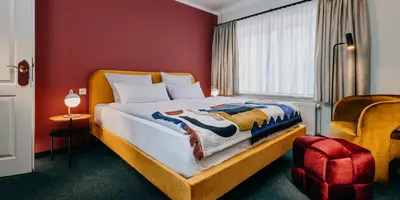Ein Bett oder Betten in einem Zimmer der Unterkunft Boutique-Hotel Zur alten Post - Stammhaus