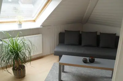 Ein Sitzbereich in der Unterkunft Ferienwohnung Robbe