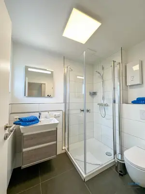 Ein Badezimmer in der Unterkunft Ferienhaus Kampweg 15