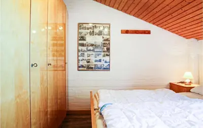 Ein Bett oder Betten in einem Zimmer der Unterkunft 2 Bedroom Cozy Apartment In Otterndorf