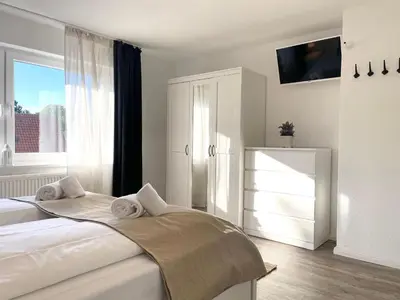 Ein Bett oder Betten in einem Zimmer der Unterkunft Wattn Traum 2