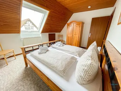 Ein Bett oder Betten in einem Zimmer der Unterkunft Refugium Storchenwiese Wohnung 1