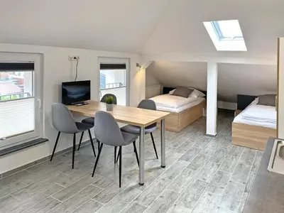 Ein Bett oder Betten in einem Zimmer der Unterkunft Dock 6 - Cuxhaven