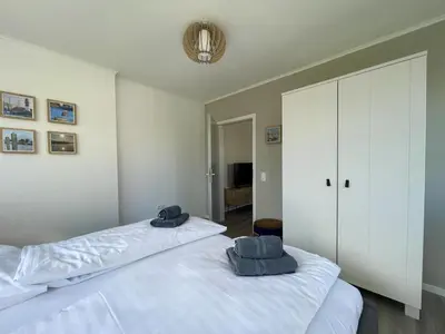 Ein Bett oder Betten in einem Zimmer der Unterkunft Seequartier 4