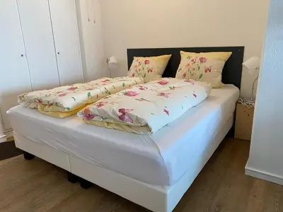 Ein Bett oder Betten in einem Zimmer der Unterkunft Büsumer Seeblick