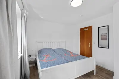 Ein Bett oder Betten in einem Zimmer der Unterkunft Henrieke