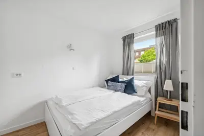 Ein Bett oder Betten in einem Zimmer der Unterkunft Gesche