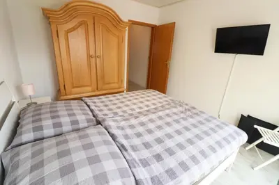 Ein Bett oder Betten in einem Zimmer der Unterkunft Inge 1