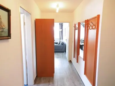 Ein Bett oder Betten in einem Zimmer der Unterkunft Haus Itjen Blau 4