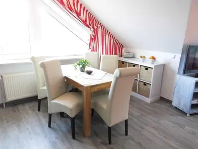 Ein Sitzbereich in der Unterkunft Haus Itjen Rot 3