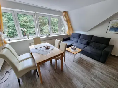 Ein Sitzbereich in der Unterkunft Haus Itjen Gelb 2