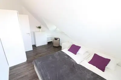 Ein Bett oder Betten in einem Zimmer der Unterkunft Ferienhaus im Angerdorf
