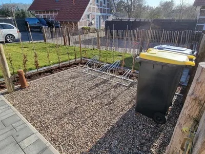 Ein Garten an der Unterkunft Ferienhaus im Angerdorf