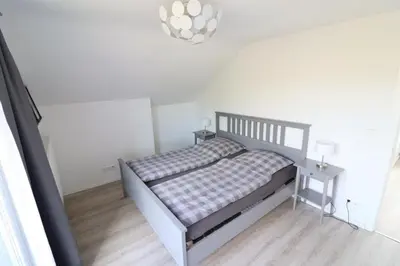 Ein Bett oder Betten in einem Zimmer der Unterkunft Meerhaus 1 OG