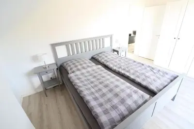 Ein Bett oder Betten in einem Zimmer der Unterkunft Meerhaus 1 OG