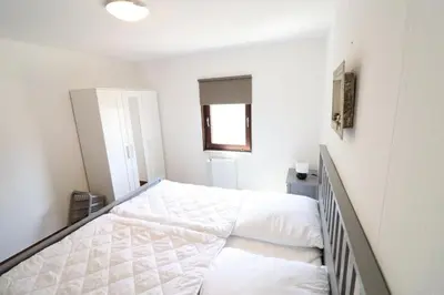 Ein Bett oder Betten in einem Zimmer der Unterkunft Haus Heideblick