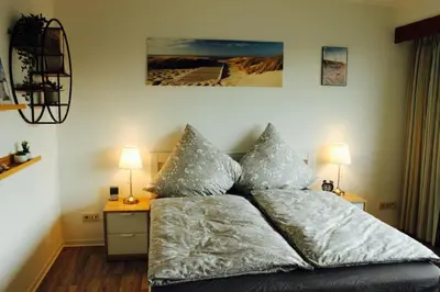 Ein Bett oder Betten in einem Zimmer der Unterkunft Jan am Strand 315