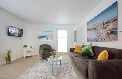 Ein Sitzbereich in der Unterkunft Haus an der Düne Ferienwohnung 5