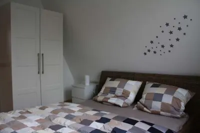 Ein Bett oder Betten in einem Zimmer der Unterkunft Am Ringwall 30