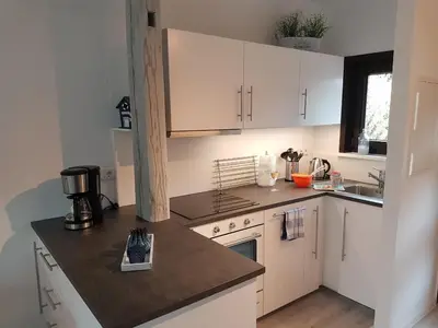 Küche/Küchenzeile in der Unterkunft Kampweg 4