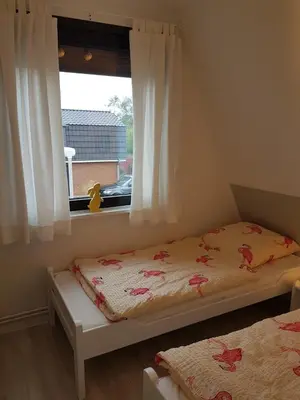 Ein Bett oder Betten in einem Zimmer der Unterkunft Kampweg 4
