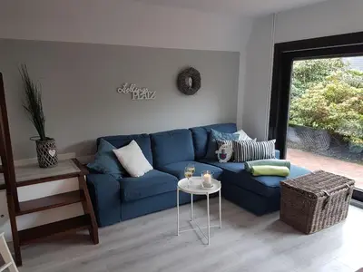 Ein Sitzbereich in der Unterkunft Kampweg 4