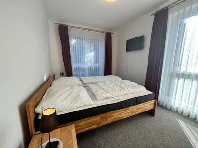 Ein Bett oder Betten in einem Zimmer der Unterkunft Voßhörn 19 a