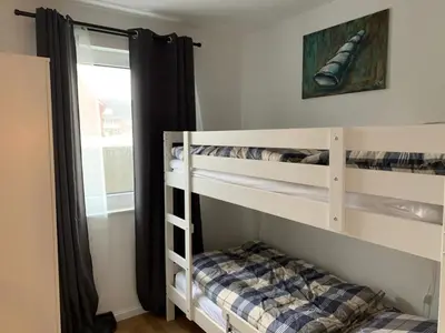 Ein Bett oder Betten in einem Zimmer der Unterkunft Residenz 32 Wohnung 4