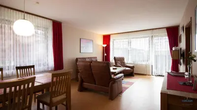 Ein Sitzbereich in der Unterkunft Haus Kerstin Duhnen Wohnung 7