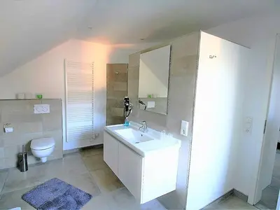 Ein Badezimmer in der Unterkunft Ferienhaus Küstenhaus Wremen