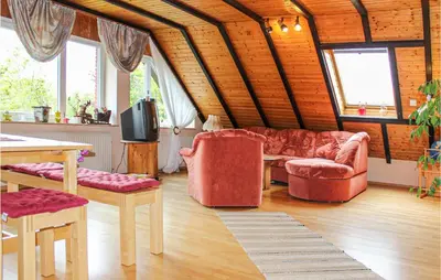 Ein Sitzbereich in der Unterkunft Nice Apartment In Wurster Nordseeküste