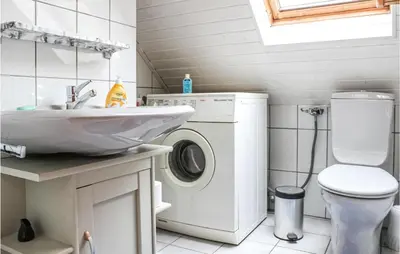Ein Badezimmer in der Unterkunft Nice Apartment In Wurster Nordseeküste