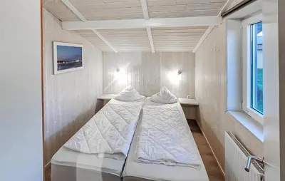 Ein Bett oder Betten in einem Zimmer der Unterkunft Friedrichskoog-Strandpark 1