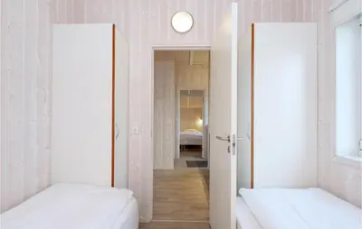 Ein Bett oder Betten in einem Zimmer der Unterkunft Friedrichskoog-Strandpark 16