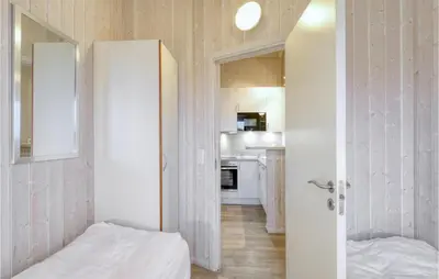 Ein Bett oder Betten in einem Zimmer der Unterkunft Friedrichskoog-Strandpark 17