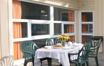 Ein Restaurant oder anderes Speiselokal in der Unterkunft Friedrichskoog-Strandpark 3
