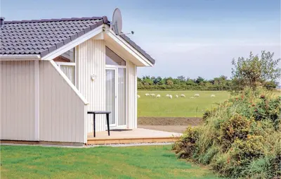 Ein Garten an der Unterkunft Friedrichskoog-Deichblick 22