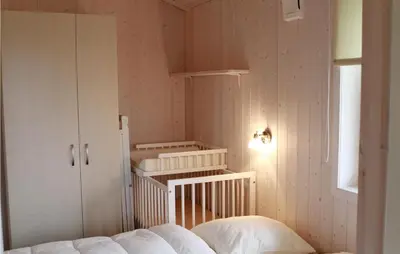Ein Bett oder Betten in einem Zimmer der Unterkunft Friedrichskoog-Deichblick 3