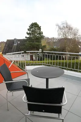 Ein Sitzbereich in der Unterkunft Oasis 08