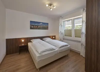 Ein Bett oder Betten in einem Zimmer der Unterkunft Op de Geest 04