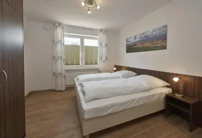 Ein Bett oder Betten in einem Zimmer der Unterkunft Op de Geest 11