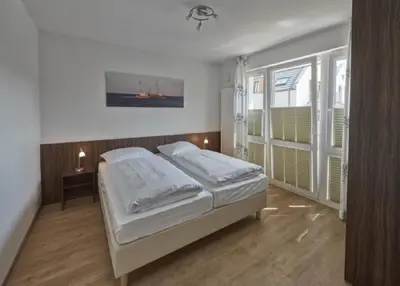 Ein Bett oder Betten in einem Zimmer der Unterkunft Op de Geest 12