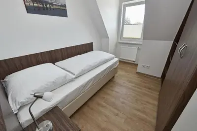 Ein Bett oder Betten in einem Zimmer der Unterkunft Op de Geest 13