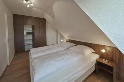 Ein Bett oder Betten in einem Zimmer der Unterkunft Op de Geest 15