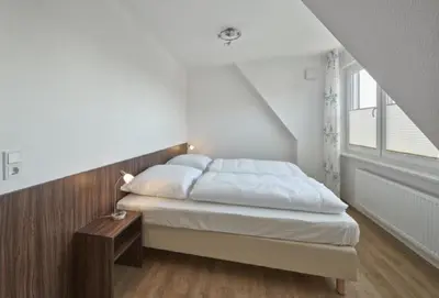 Ein Bett oder Betten in einem Zimmer der Unterkunft Op de Geest 16