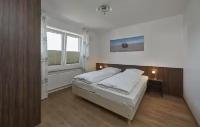 Ein Bett oder Betten in einem Zimmer der Unterkunft Op de Geest 10