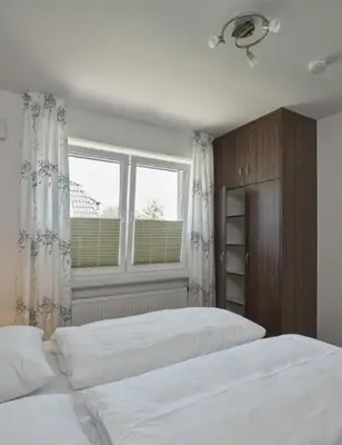 Ein Bett oder Betten in einem Zimmer der Unterkunft Op de Geest 10
