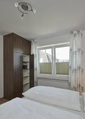 Ein Bett oder Betten in einem Zimmer der Unterkunft Op de Geest 10