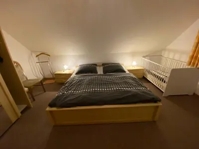 Ein Bett oder Betten in einem Zimmer der Unterkunft Ferienhaus Hoppas