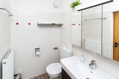 Ein Badezimmer in der Unterkunft Haus Mühlentrift Döse